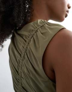 Model wearing Drawcord detail tech fabric balloon maxi dress in khaki