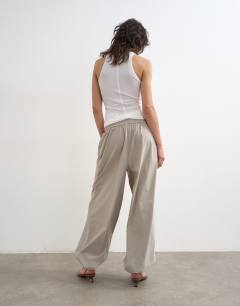 Model wearing Drawcord tech fabric balloon trousers in slate