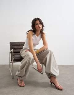 Model wearing Drawcord tech fabric balloon trousers in slate