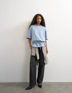Model wearing Drawstring hem tee in dusty blue
