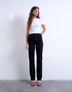 Model wearing Dree high rise slim straight leg jean in black