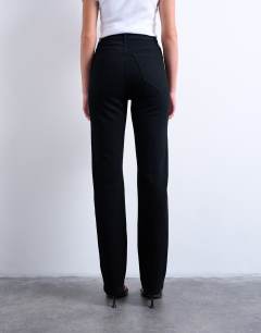 Model wearing Dree high rise slim straight leg jean in black
