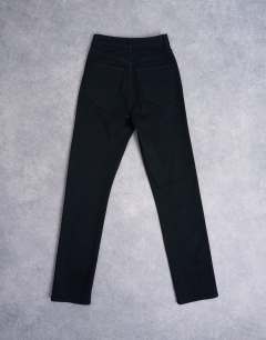 Model wearing Dree high rise slim straight leg jean in black