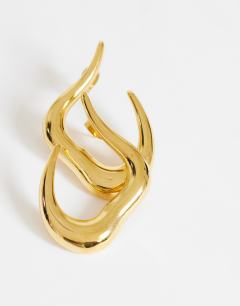 Model wearing Drew waterproof asymmetric hoop earring in gold