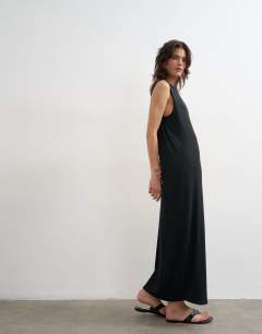 Model wearing Drop armhole rib maxi dress in black