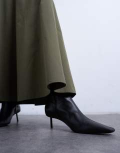 Model wearing Drop waist full circle maxi skirt in khaki