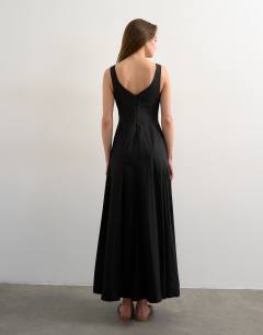 Model wearing Dropped hem full circle skirt sundress in black