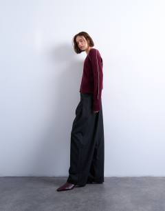 Model wearing Dropped waist barrel trouser in grey stripe herringbone