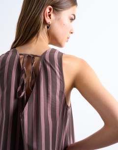 Model wearing Dropped waist chuck on poplin midi dress in pink and choc stripe