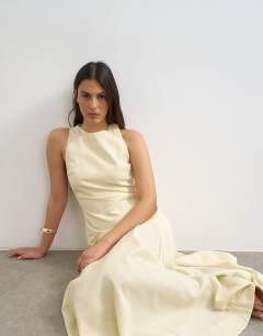 Model wearing Dropped waist full circle hem midi dress in buttermilk