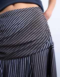 Model wearing Dropped waist full hem maxi skirt in  stripe