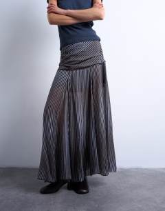 Model wearing Dropped waist full hem maxi skirt in  stripe