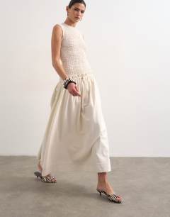 Model wearing Dropped waist heavy cotton maxi dress in white