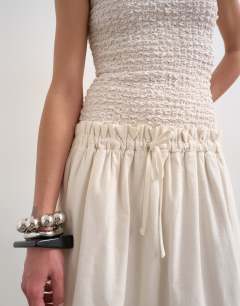 Model wearing Dropped waist heavy cotton maxi dress in white