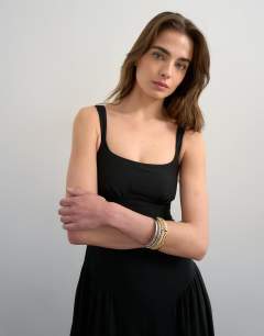 Model wearing Dropped waist maxi dress in black