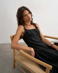 Model wearing Dropped waist maxi dress in black
