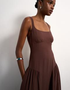 Model wearing Dropped waist maxi dress in chocolate