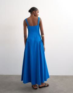 Model wearing Dropped waist maxi dress in cobalt