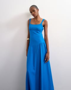 Model wearing Dropped waist maxi dress in cobalt