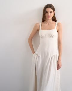 Model wearing Dropped waist maxi dress in natural linen