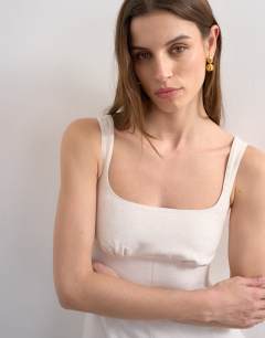 Model wearing Dropped waist maxi dress in natural linen