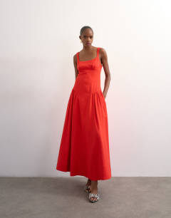 Model wearing Dropped waist maxi sundress in red