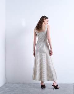 Model wearing Dropped waist woven stripe midi dress in mono