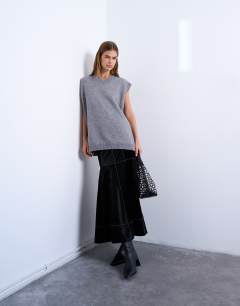 Model wearing Dropwaist contrast stitched PU maxi skirt in black