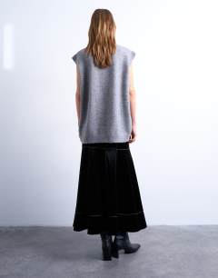 Model wearing Dropwaist contrast stitched PU maxi skirt in black