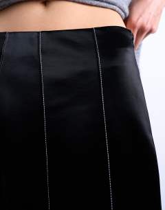 Model wearing Dropwaist contrast stitched PU maxi skirt in black