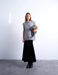 Model wearing Dropwaist contrast stitched PU maxi skirt in black