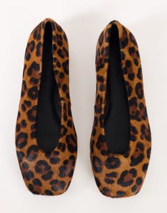 Model wearing Duke chiselled ballet flat in leopard hair on real leather