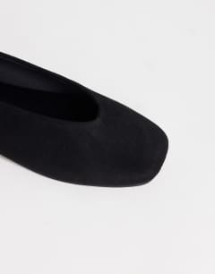 Model wearing Duke faux suede chiselled ballet flat in black