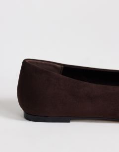 Model wearing Duke faux suede chiselled ballet flat in chocolate