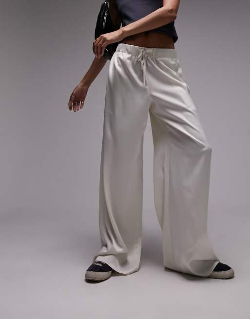 Topshop – Einfarbige Satinhose in Champagner mit weitem Schnitt 
