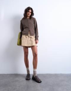 Model wearing Elasticated waist mini skort in beige