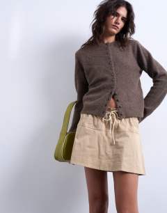 Model wearing Elasticated waist mini skort in beige