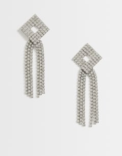 Model wearing Eliza stud tassel embellished earring in silver