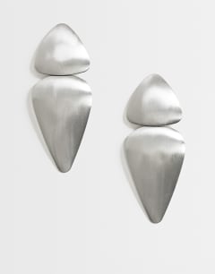 Model wearing Elliot statement stud earring in silver brushed