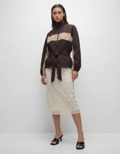 Model wearing Embellished sequin midi skirt in ivory