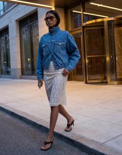 Model wearing Embellished sequin midi skirt in ivory