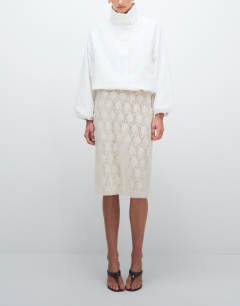 Model wearing Embellished sequin midi skirt in ivory