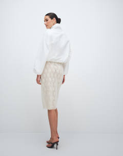 Model wearing Embellished sequin midi skirt in ivory