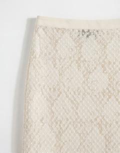 Model wearing Embellished sequin midi skirt in ivory