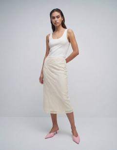 Model wearing Embellished sequin midi skirt in ivory