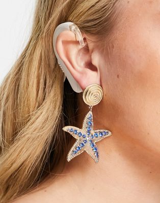 Topshop embellished starfish drop earrings in gold and blue