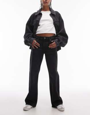 Topshop - Ember - Jeans met wijde pijpen en lage taille in zwart met wassing