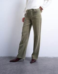 Model wearing Ember low rise cord jean in sage