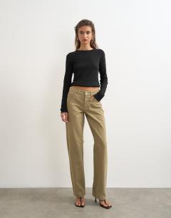 Model wearing Ember low rise relaxed straight jean in sand