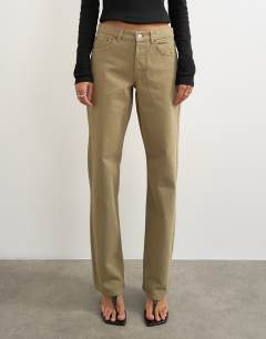 Model wearing Ember low rise relaxed straight jean in sand